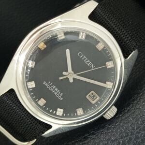 Vintage 1985 Citizen Manual Mens Silver Watch W/daydate & Black accents